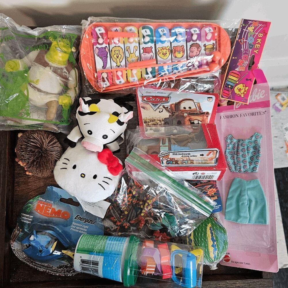 Lot of 10+ Assorted Toys Shrek,Barbie, Nemo, Cars, Hello Kitty & more